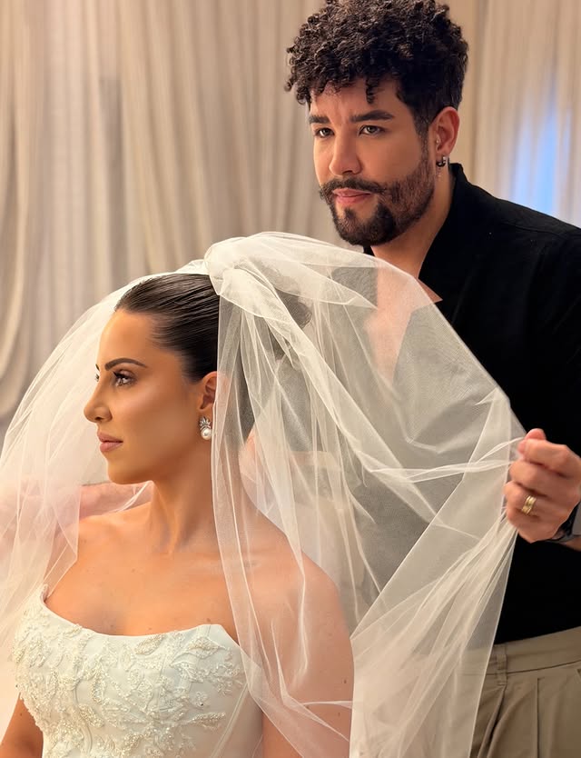 Paulo Henrique ajustando véu de noiva